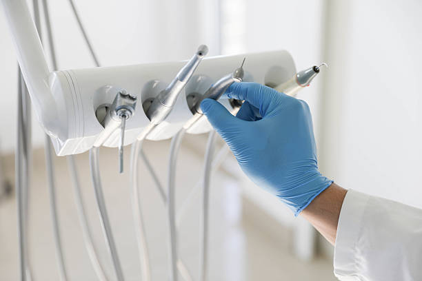 Professional Tooth Extraction technician working in Brownsburg, IN